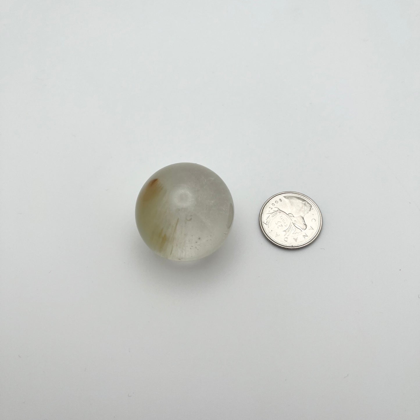 Chlorite in Rutilated Quartz Spheres