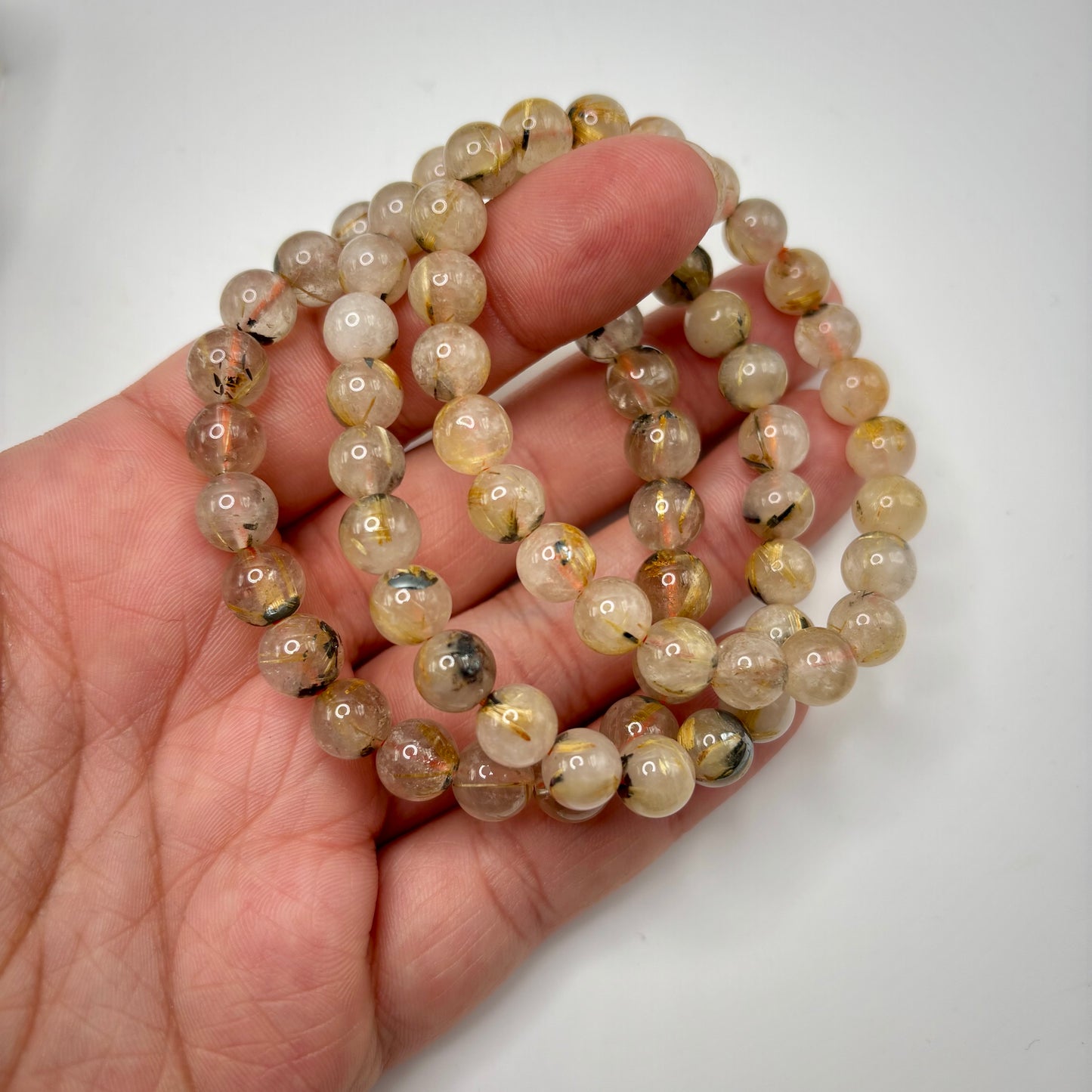 Golden Rutile in Quartz Bracelets