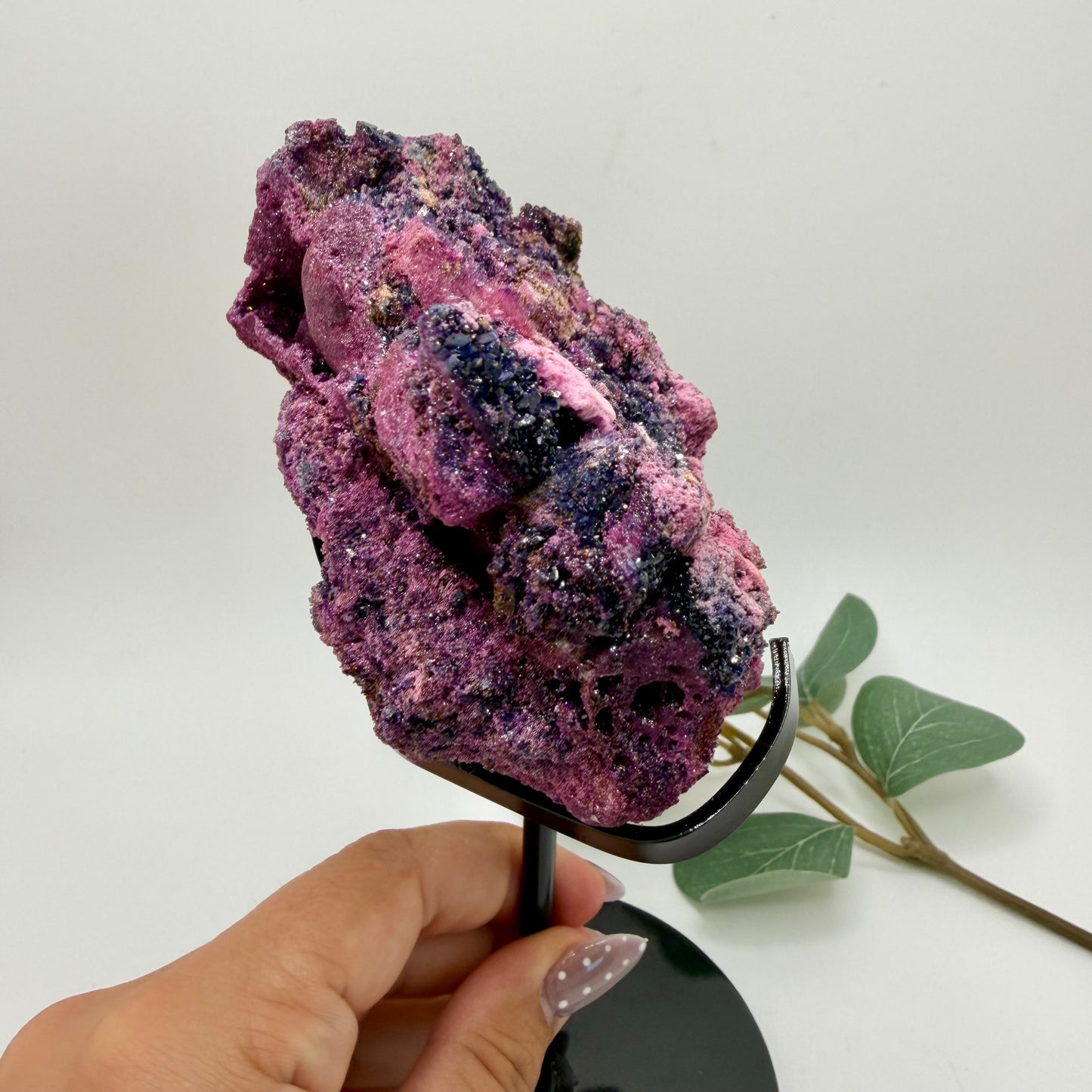 Ruby and Sapphire raw piece on custom stand