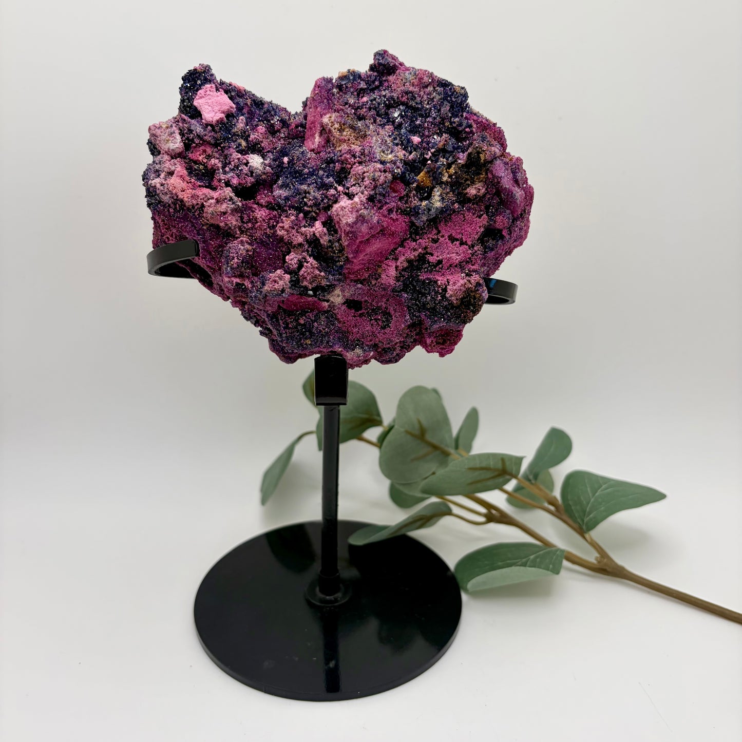Ruby and Sapphire raw piece on custom stand