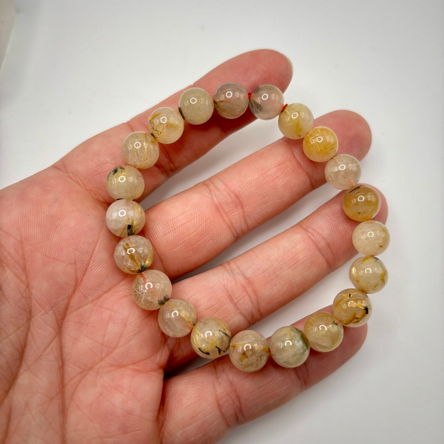 Golden Rutile in Quartz Bracelets