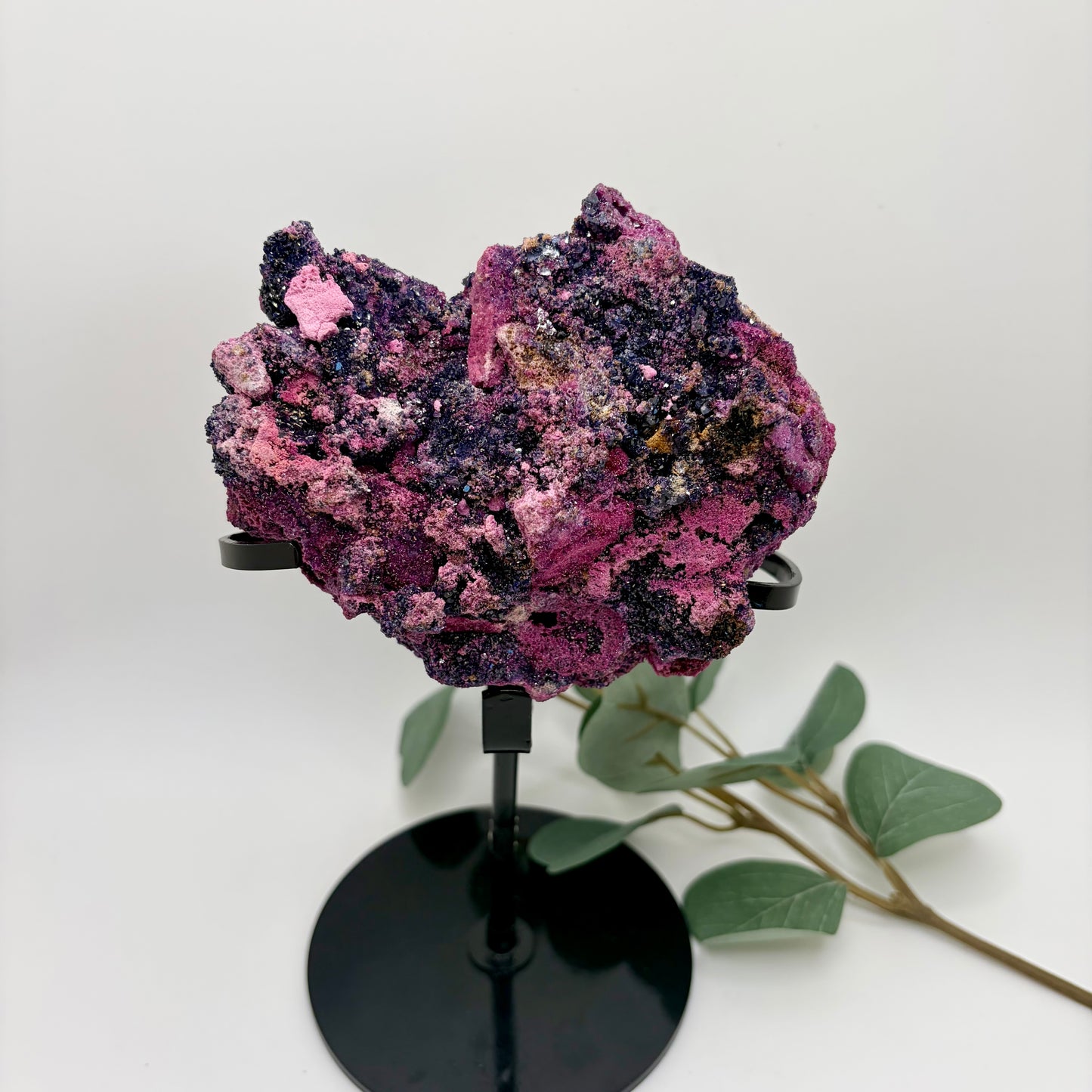 Ruby and Sapphire raw piece on custom stand